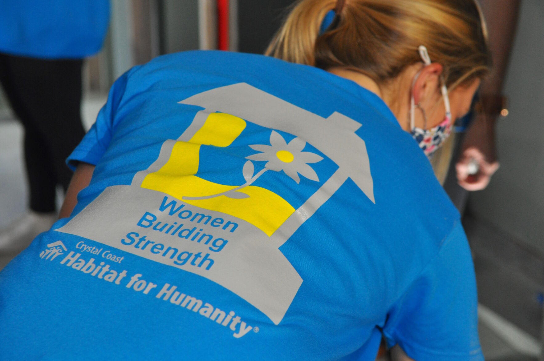 Women team up to on Habitat for Humanity build for single mother